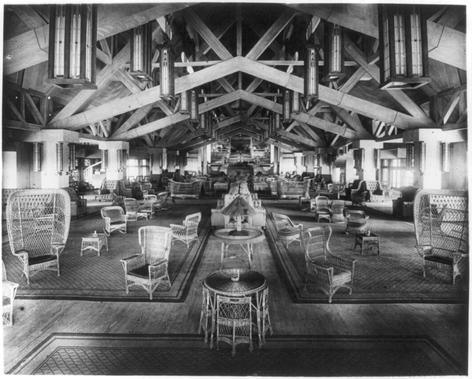 Yellowstone National Park: Grand Canyon Hotel lounge toward office, c1922. — historic photograph