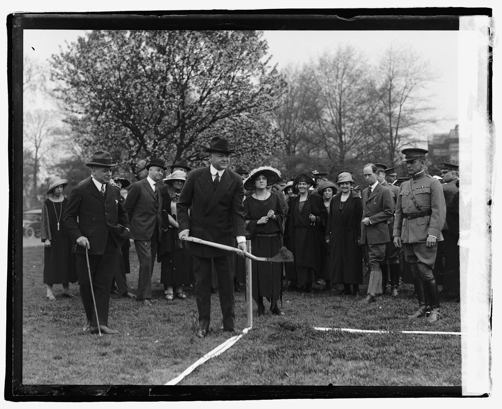 Hoover breaking ground for model house, 4/23/23, [19]23 April 23. — historic photograph