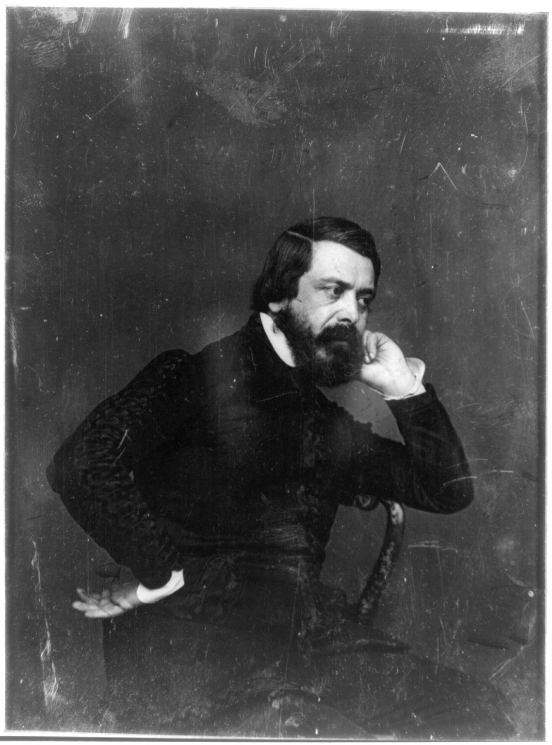 Seated bearded man in dark coat, three-quarter view, 1844 — historic photograph