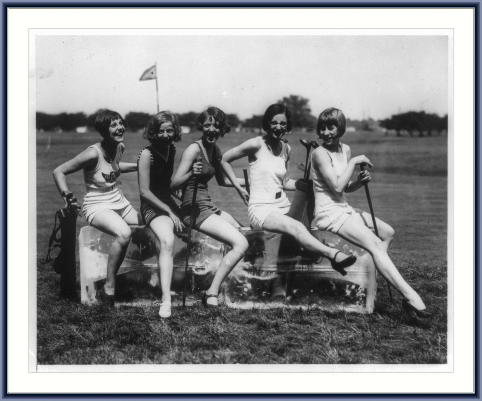 Keeping cool on the golf course, [between 1920 and 1932] — historic photograph