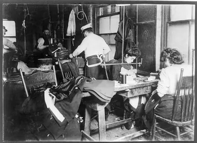 A group of sweatshop workers. Mr. Silberman, 30 Suffolk St. Photo taken after 3 P.M. February 21st, 1908, Witness Mrs. Lillian Hosford. Location: New York, New York (State) / by Lewis W. Hine.