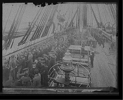U.S.S. Pensacola, hoisting the launch