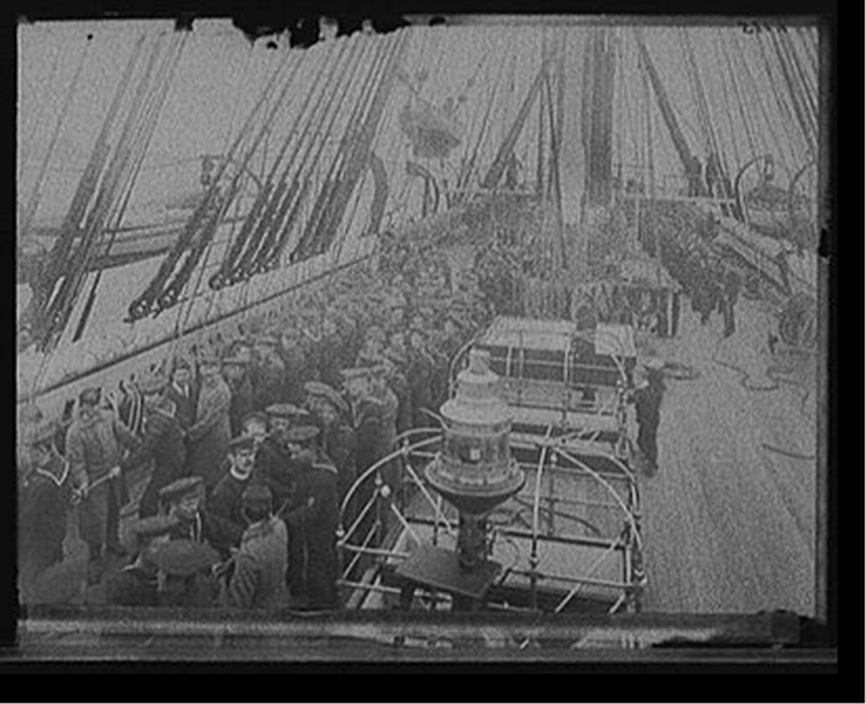 U.S.S. Pensacola, hoisting the launch, [between 1890 and 1901] — historic photograph