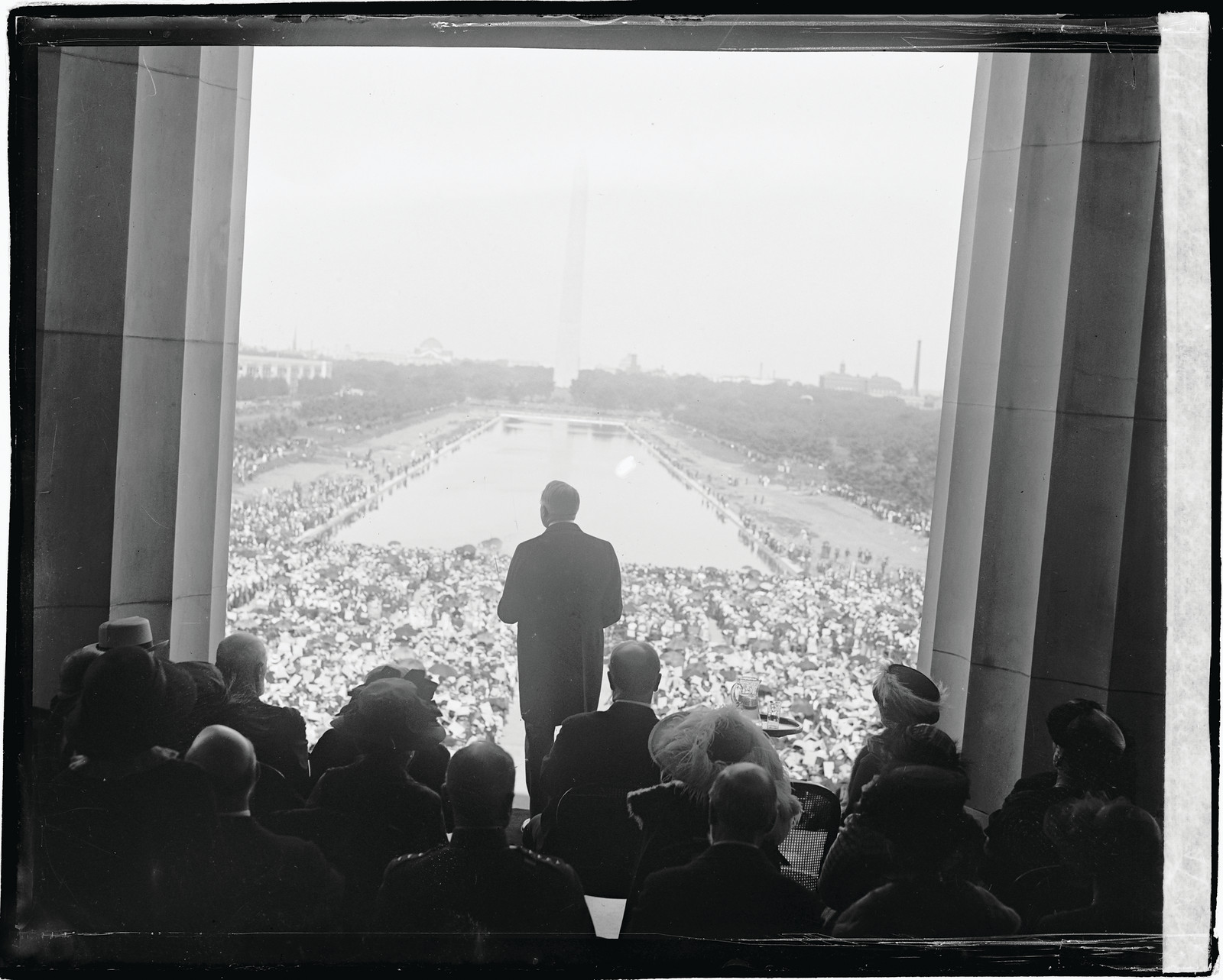 Speaker at Lincoln Memorial overlooking crowd by Reflecting Pool — historic image