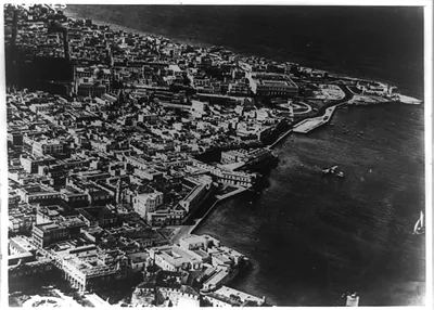 A Bird's-eye view of Havana. A bird's-eye view of the waterfront at Havana, Cuba, made by a Naval aviator skimming the skies above Cuba's capital. The view shown here is looking northwest along the waterfront and business district