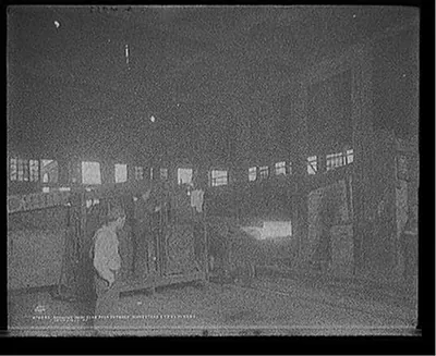 Removing ingot slab from furnace, Homestead Steel Works, Homestead, Pa.