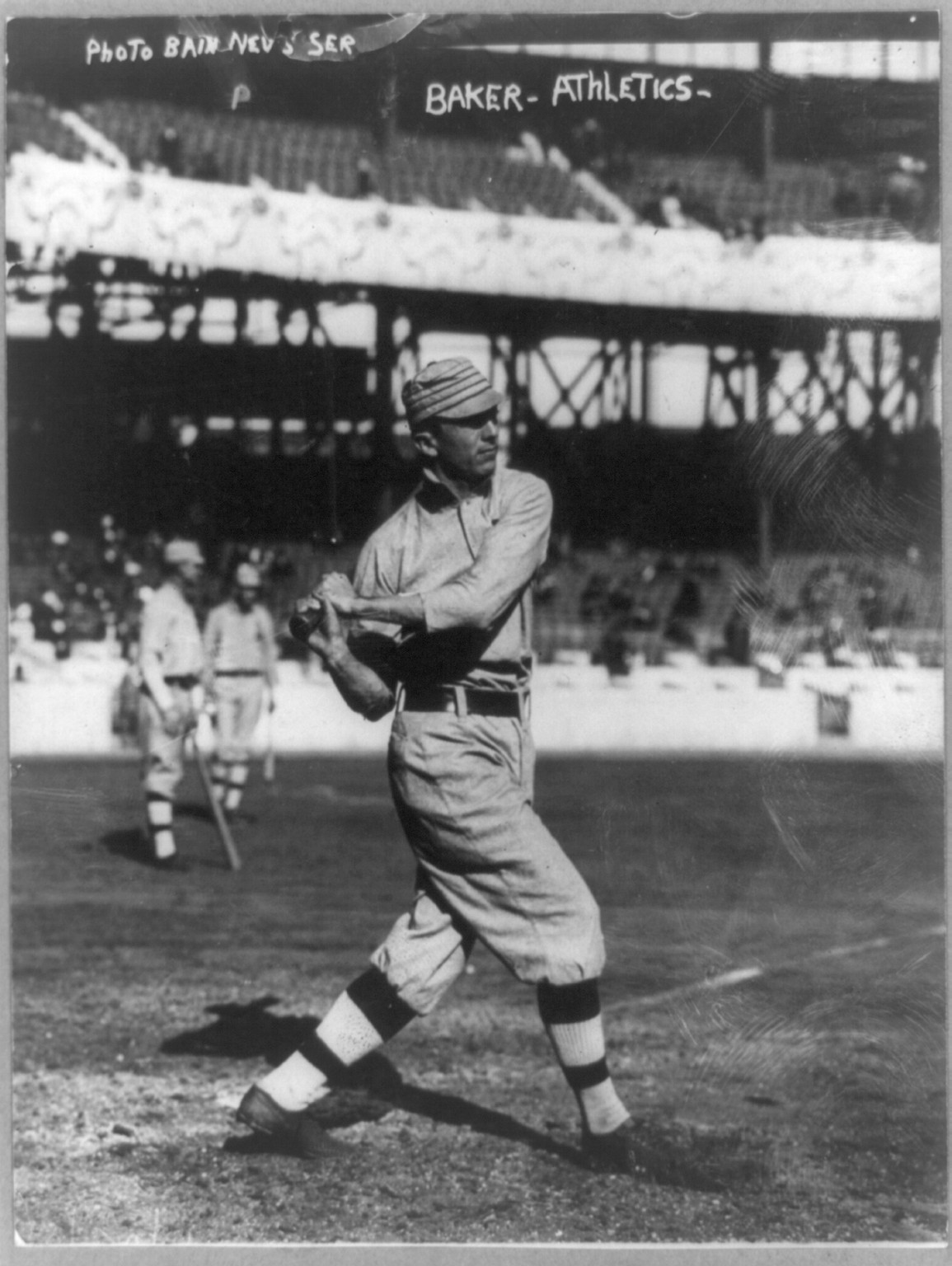 [John Franklin Baker, baseball player for Philadelphia Athletics, swinging bat], [1914] — historic photograph