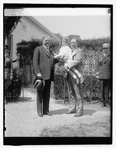 Hoover receiving Buddy Poppy, [4/24/29]