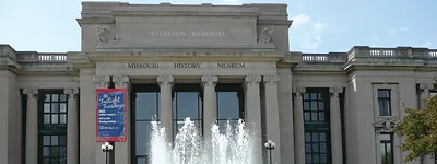 Missouri History Museum facade with fountain and Twilight Tuesdays banner