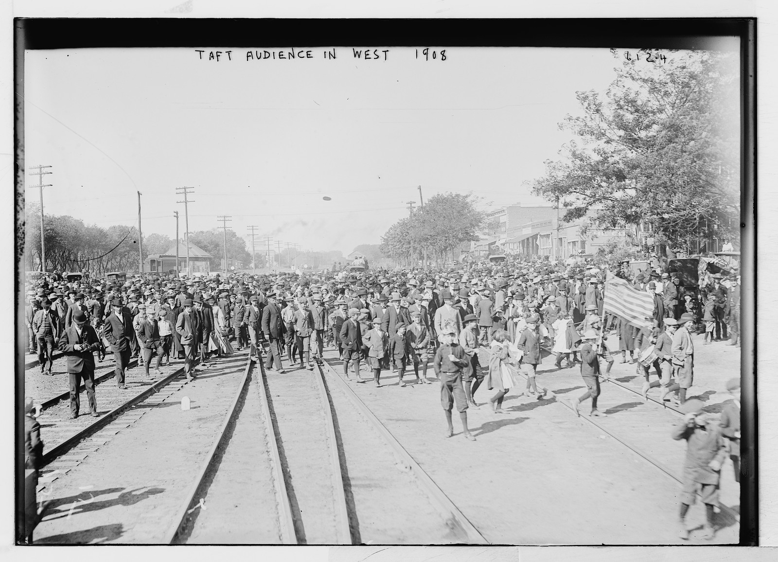 Taft crowd on railroad tracks in West, 1908 — historic photograph