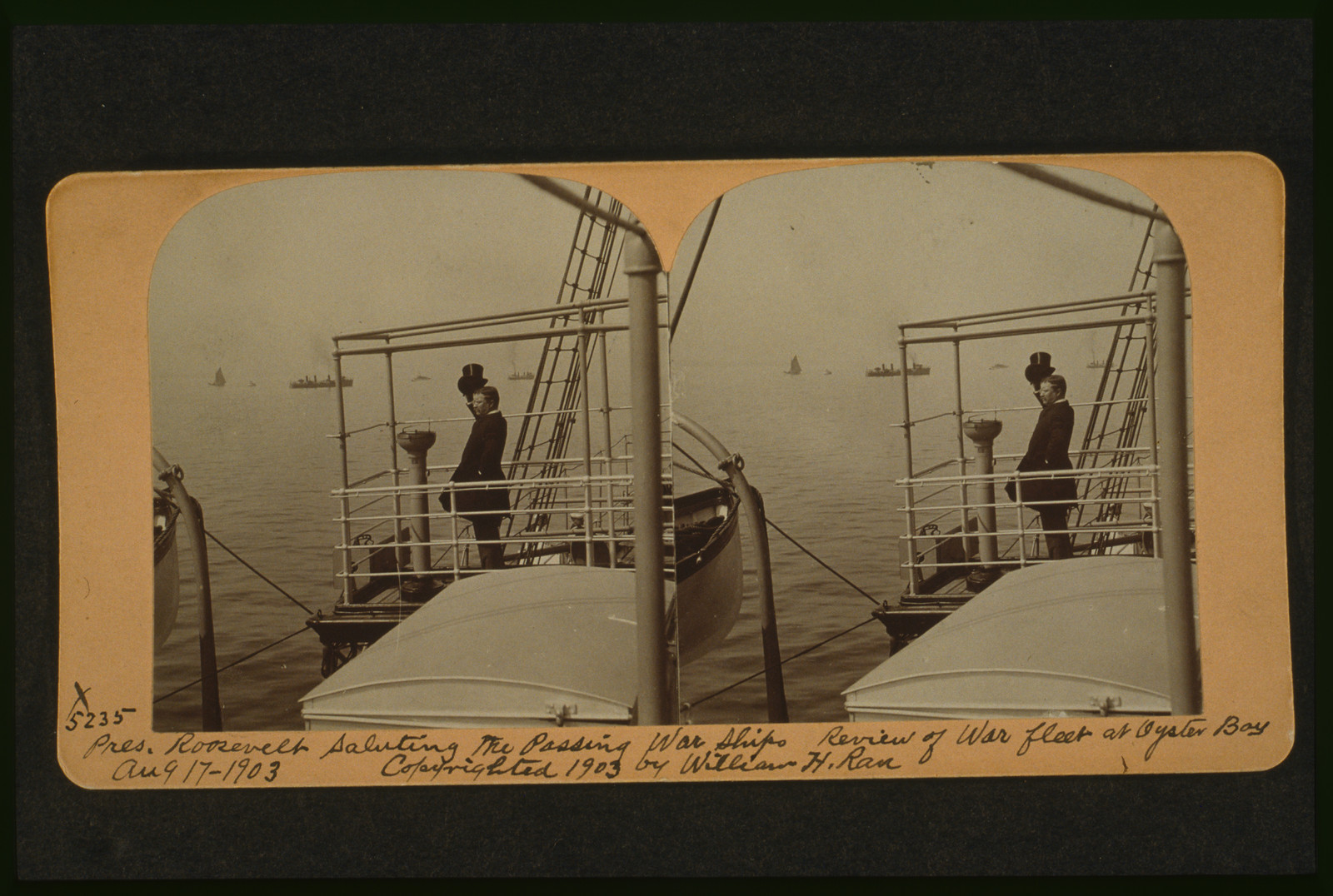 Pres. Roosevelt saluting the passing war ships--Review of war fleet at Oyster Bay, Aug. 17, 1903, c1903. — historic photograph