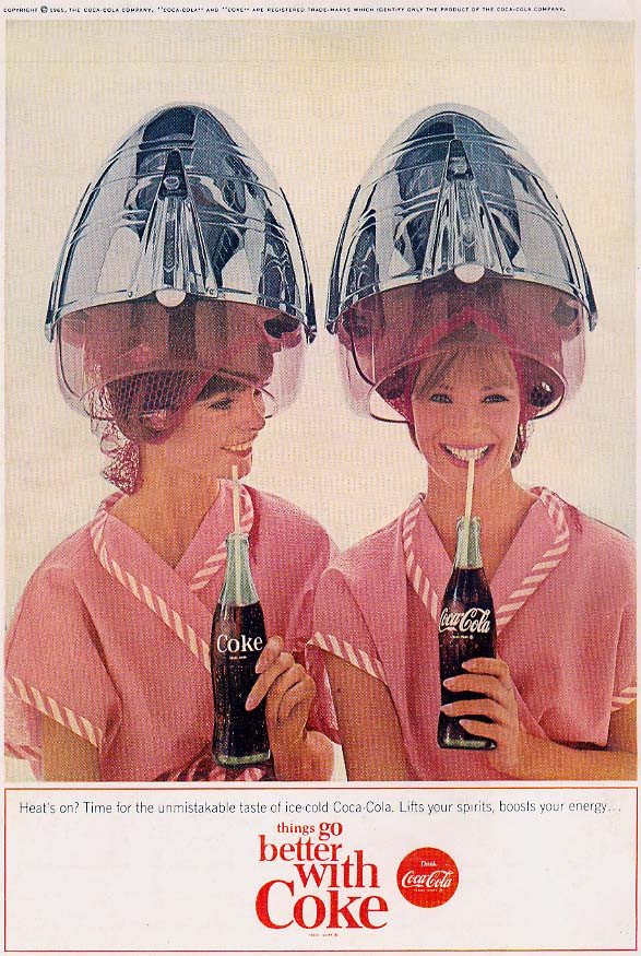 Coca-Cola magazine advertisement with two women under hair dryers — historic image