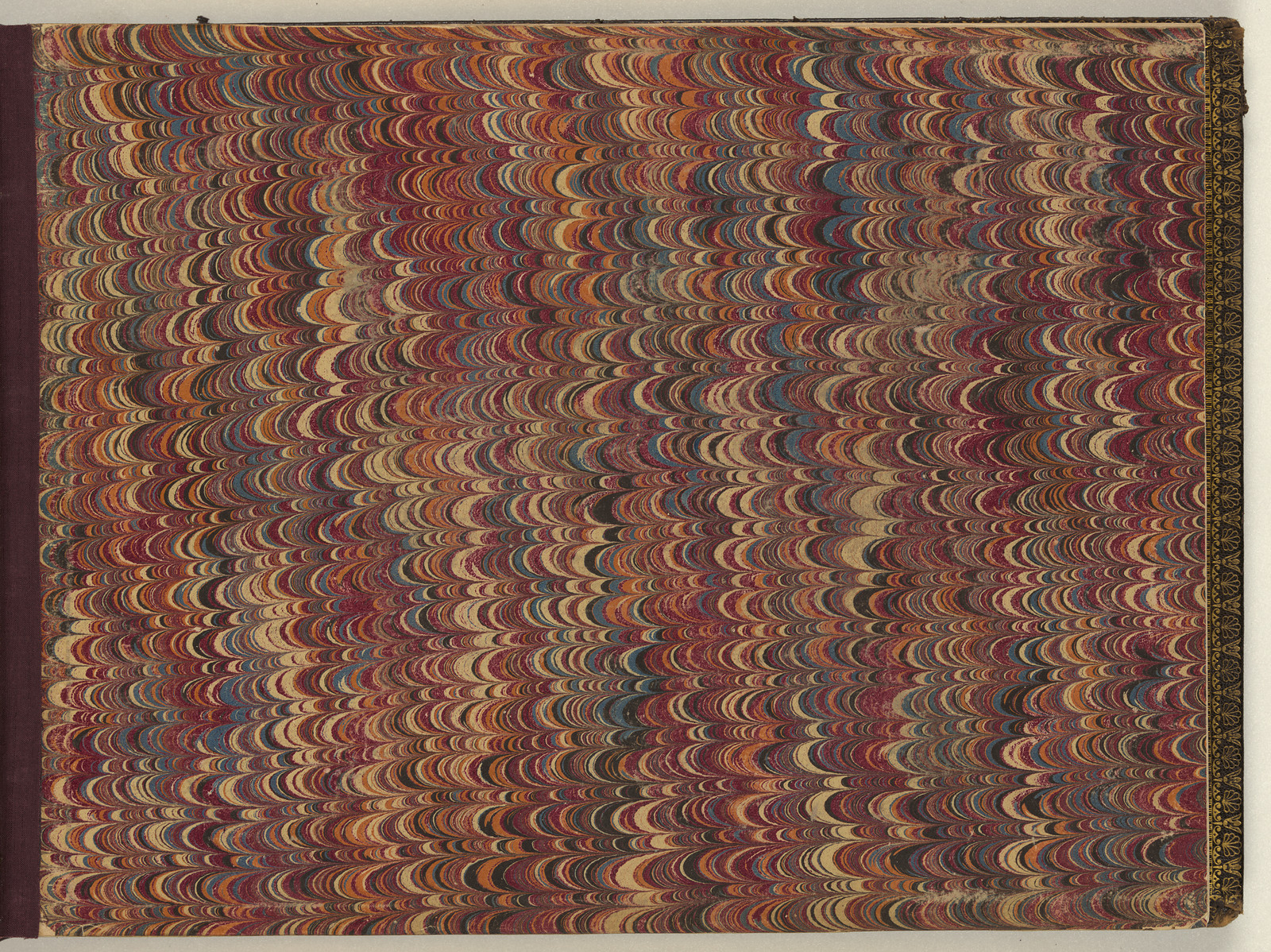 Marbled paper with repeating crescent pattern in red and cream — historic image