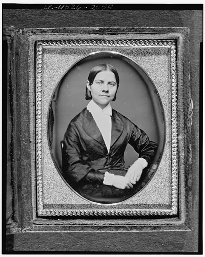 [Lucy Stone, half-length portrait of a woman, seated, facing front]