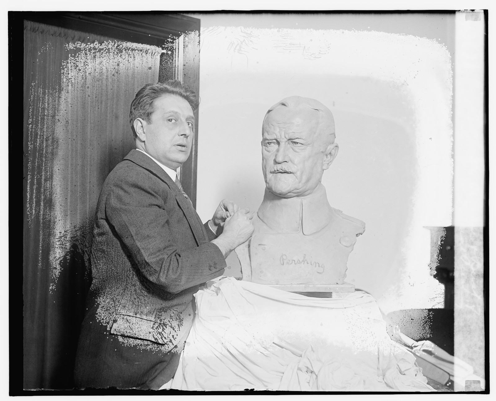 Edgardo Simone & Bust of Gen'l Pershing, [between 1909 and 1932] — historic photograph