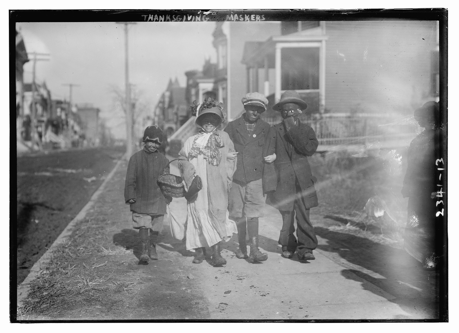 Thanksgiving Maskers, n/a — historic photograph