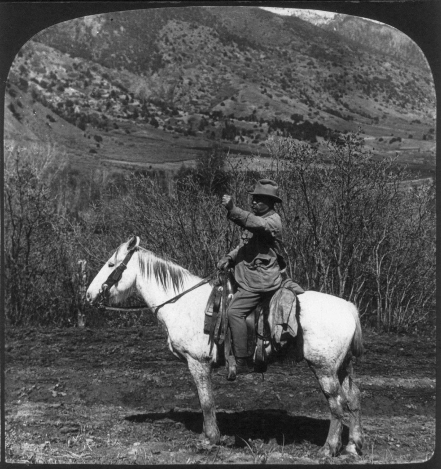 [Theodore] Roosevelt, the great American of today in roughing costume ready for the trail, West Divide, c1905. — historic photograph