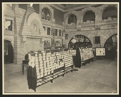 Stone-arched interior with book display racks