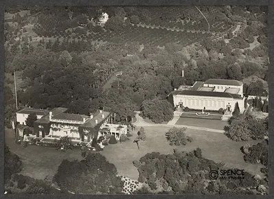 Aerial view of a mansion, classical gallery and gardens