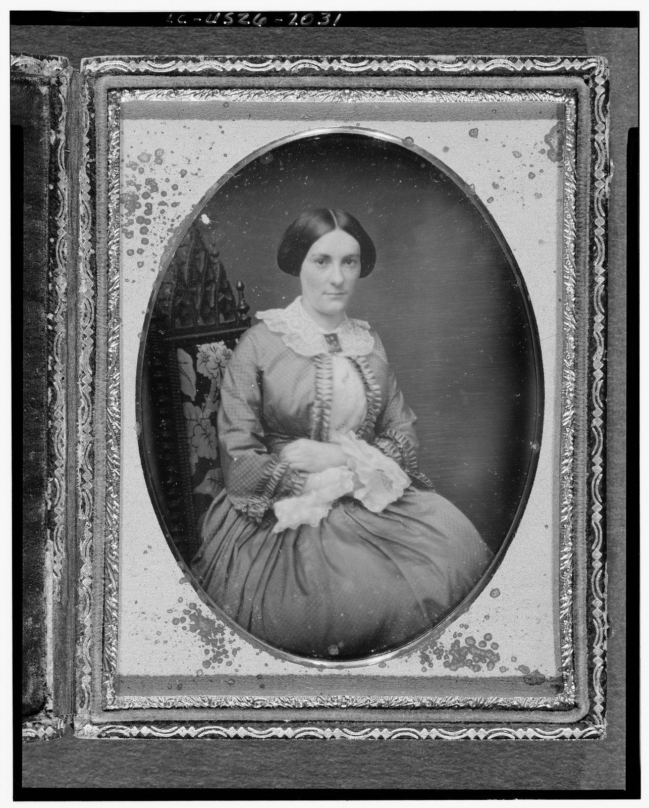 Seated woman in lace collar, daguerreotype portrait, 1854 — historic photograph