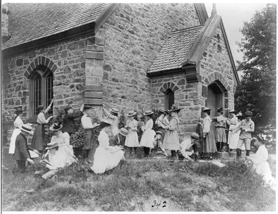 [School children measuring and sketching at a stone building, Washington, D.C.]