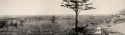 Panoramic view of the Gettysburg battlefield with a monument