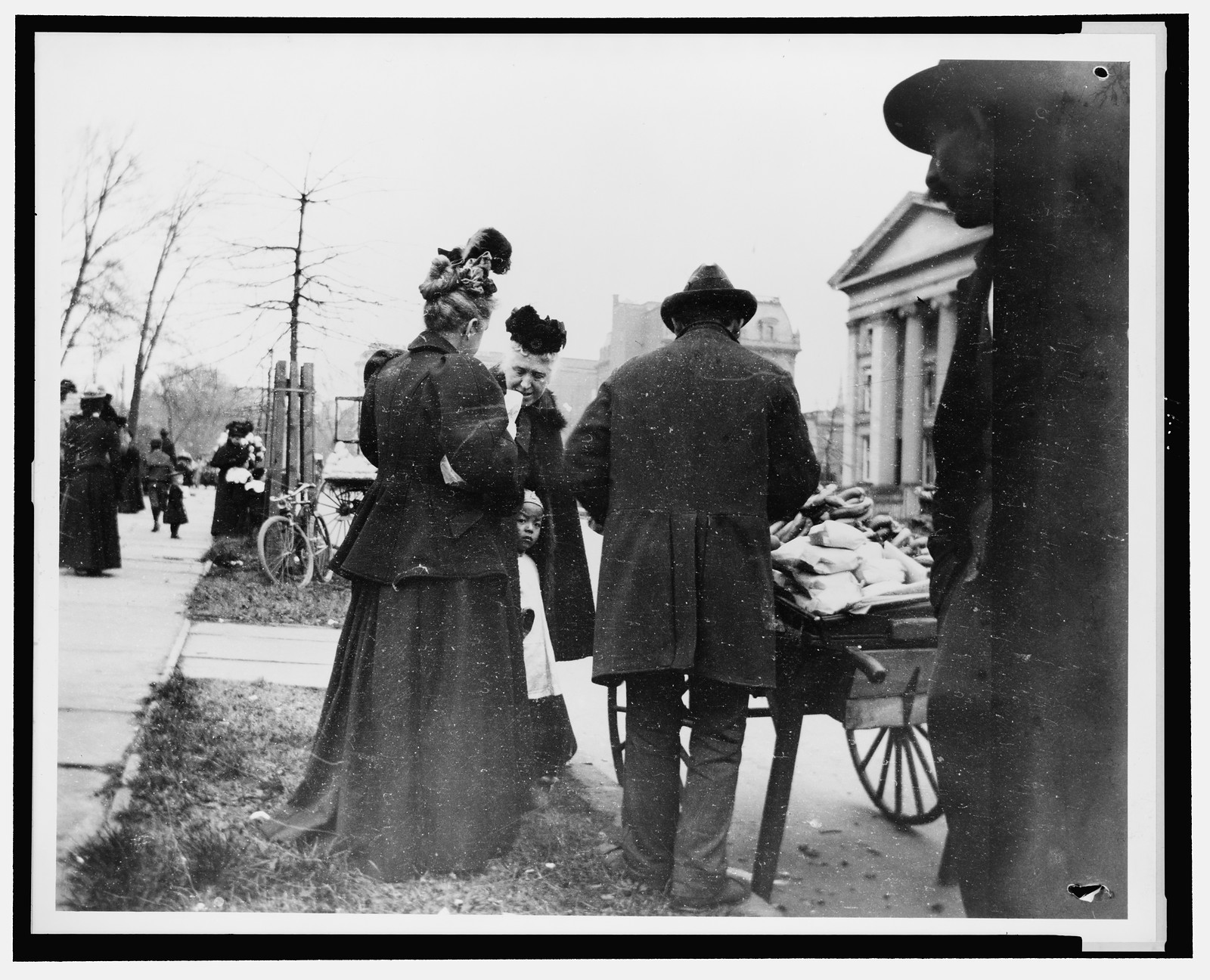 [Vendor and cart near the White House during the egg rolling], [1898] — historic photograph