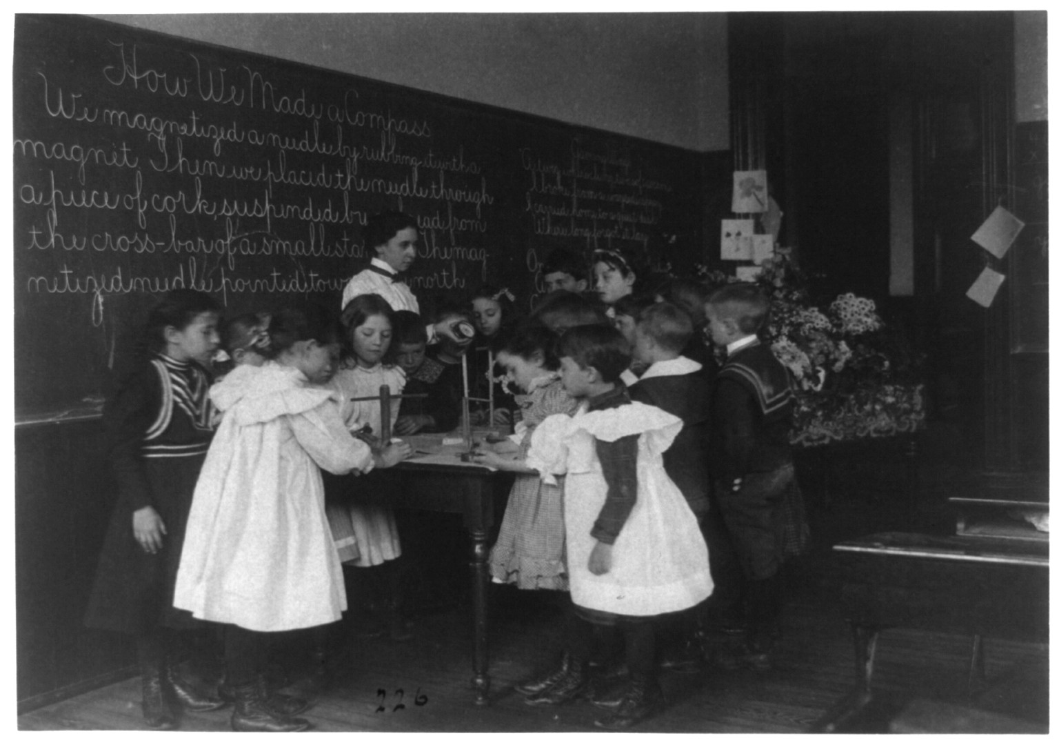 [Children in school in Washington, D.C. - learning how a compass is made], [1899?] — historic photograph