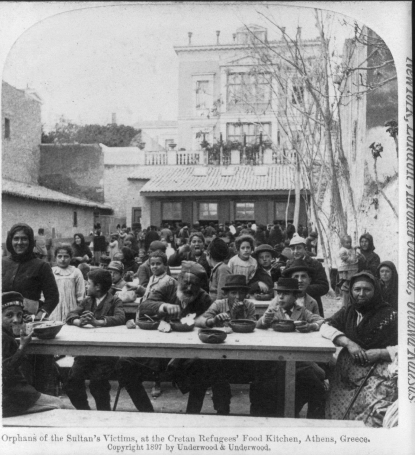 Orphans of Sultan's victims, at the Cretan refugees' food kitchen, Athens, Greece, c1897. — historic photograph