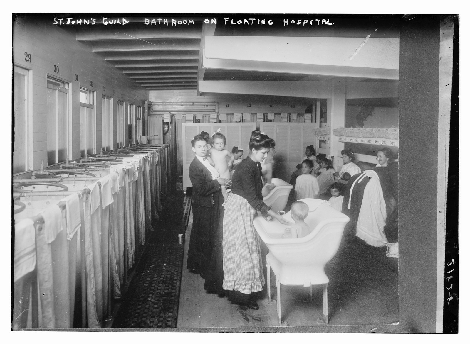 St. John's Guild. Bathroom on floating hospital, n/a — historic photograph