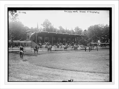 Plainfield Horse Show, horses and riders in ring, before grandstand