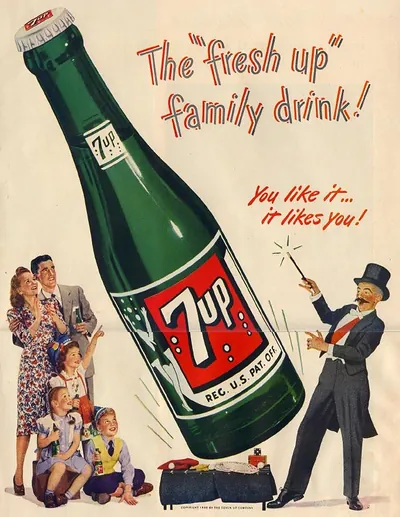 Vintage 7up advertisement: giant bottle, family drink