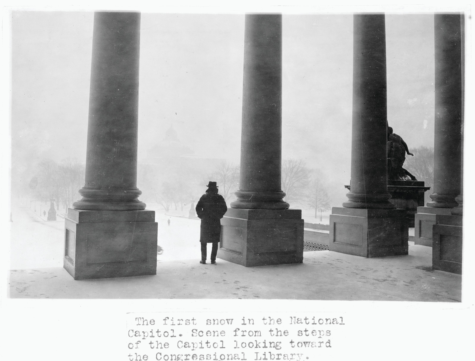 The First Snow in the National Capitol - Scene from the Steps of the U.S. Capitol, Looking Toward the Congressional Library. on publication, 1923 — historic photograph
