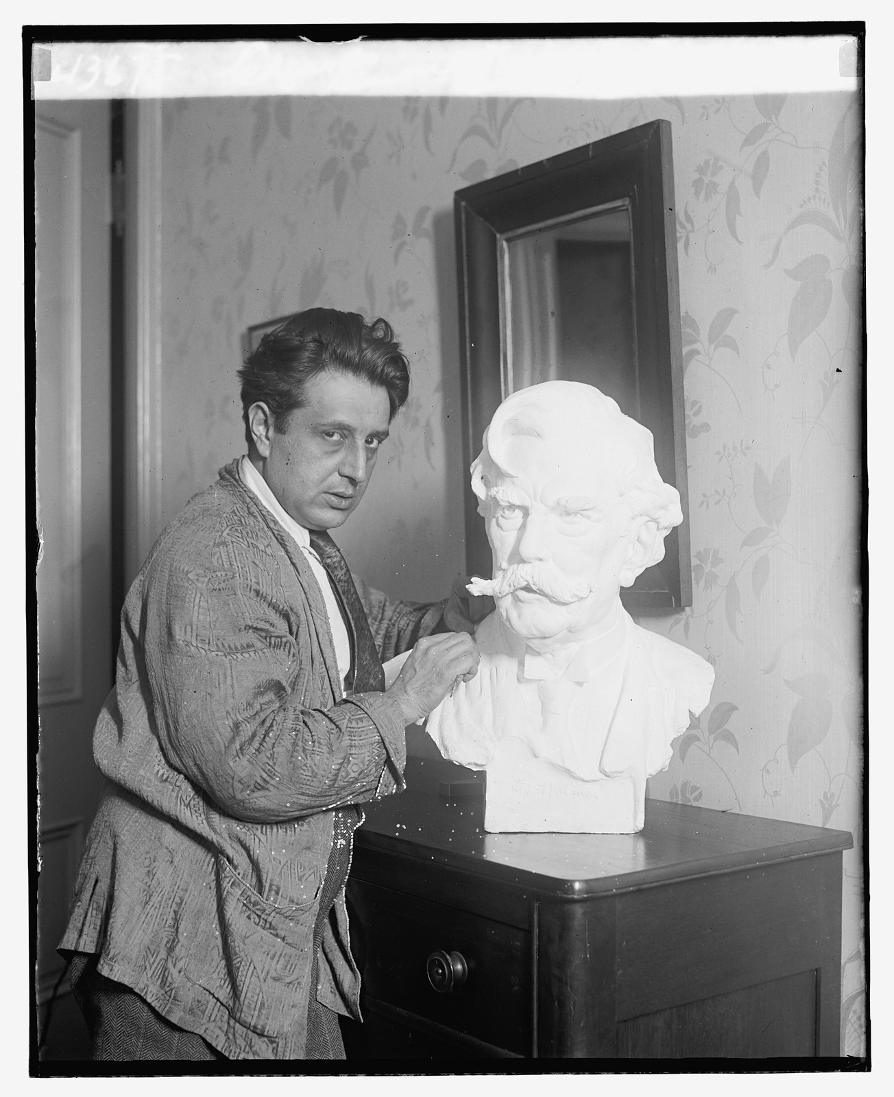 Edgardo Simone & Bust of Justice Holmes, [between 1909 and 1932] — historic photograph