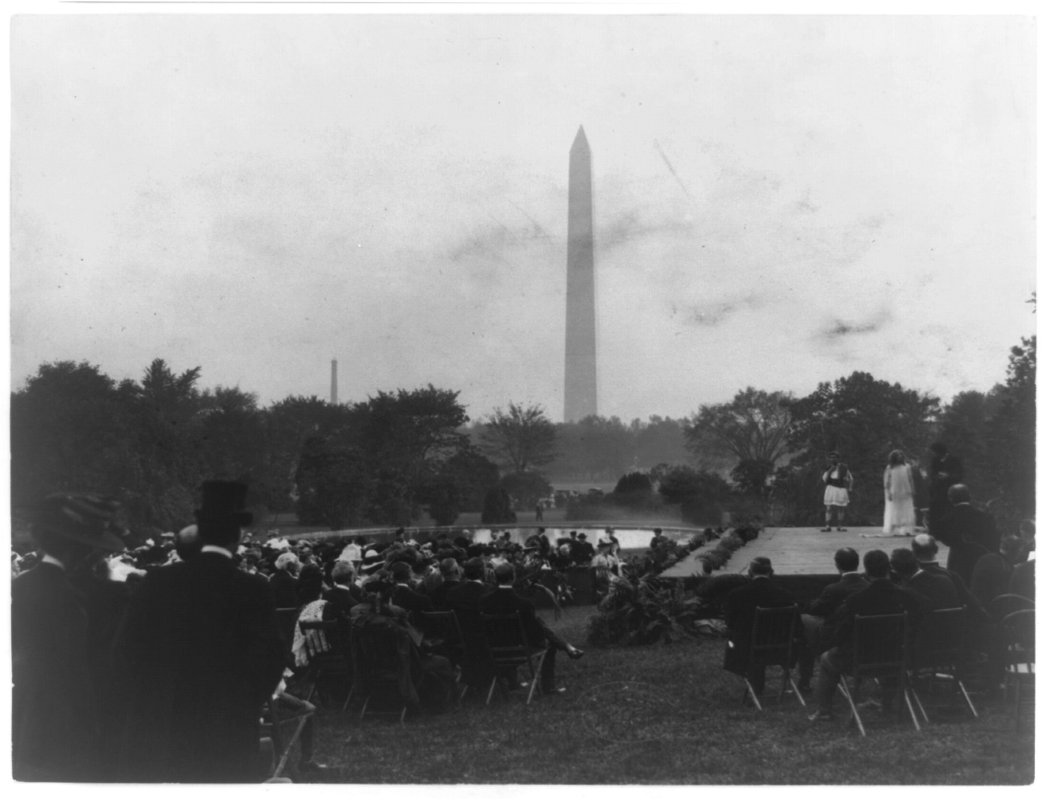 Sylvan plays on White House grounds with President and government officials in attendance, c1908. — historic photograph