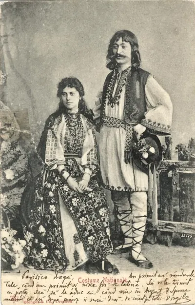 Romanian couple in national costume, postcard with handwritten message