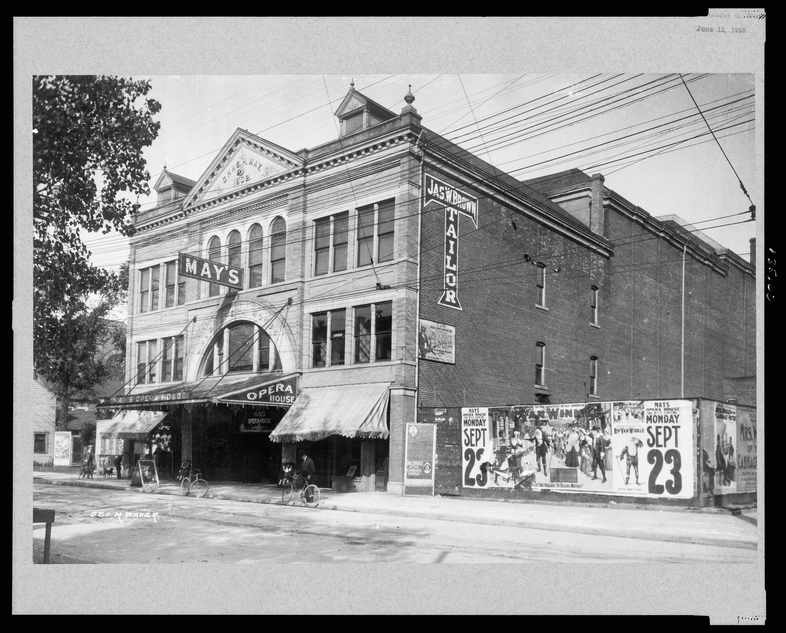 May's Opera House and Jas. W. Brown Tailor Shop — historic photograph