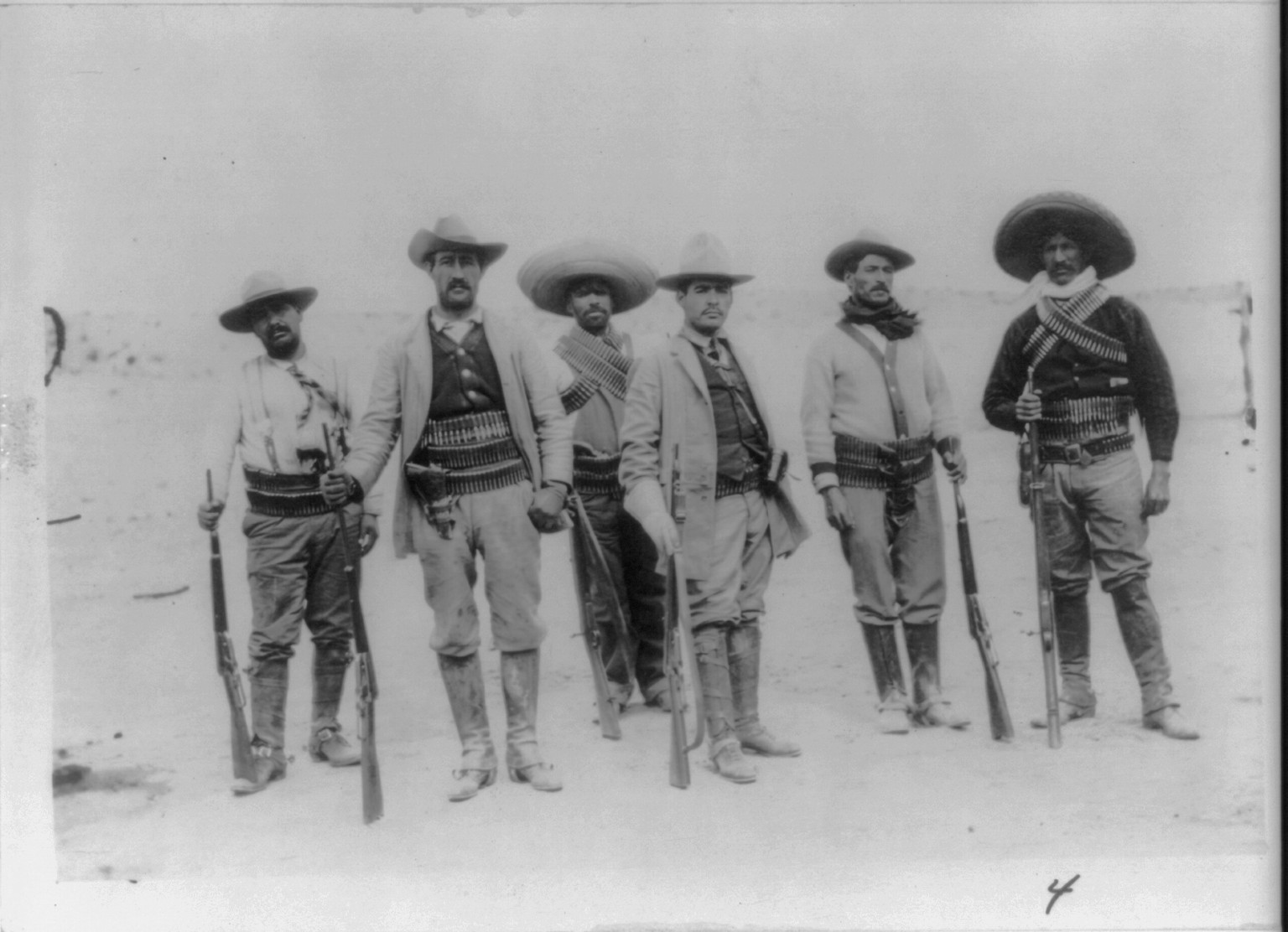 [Gen. Campa, full, standing, with Insurrecto staff] — historic photograph