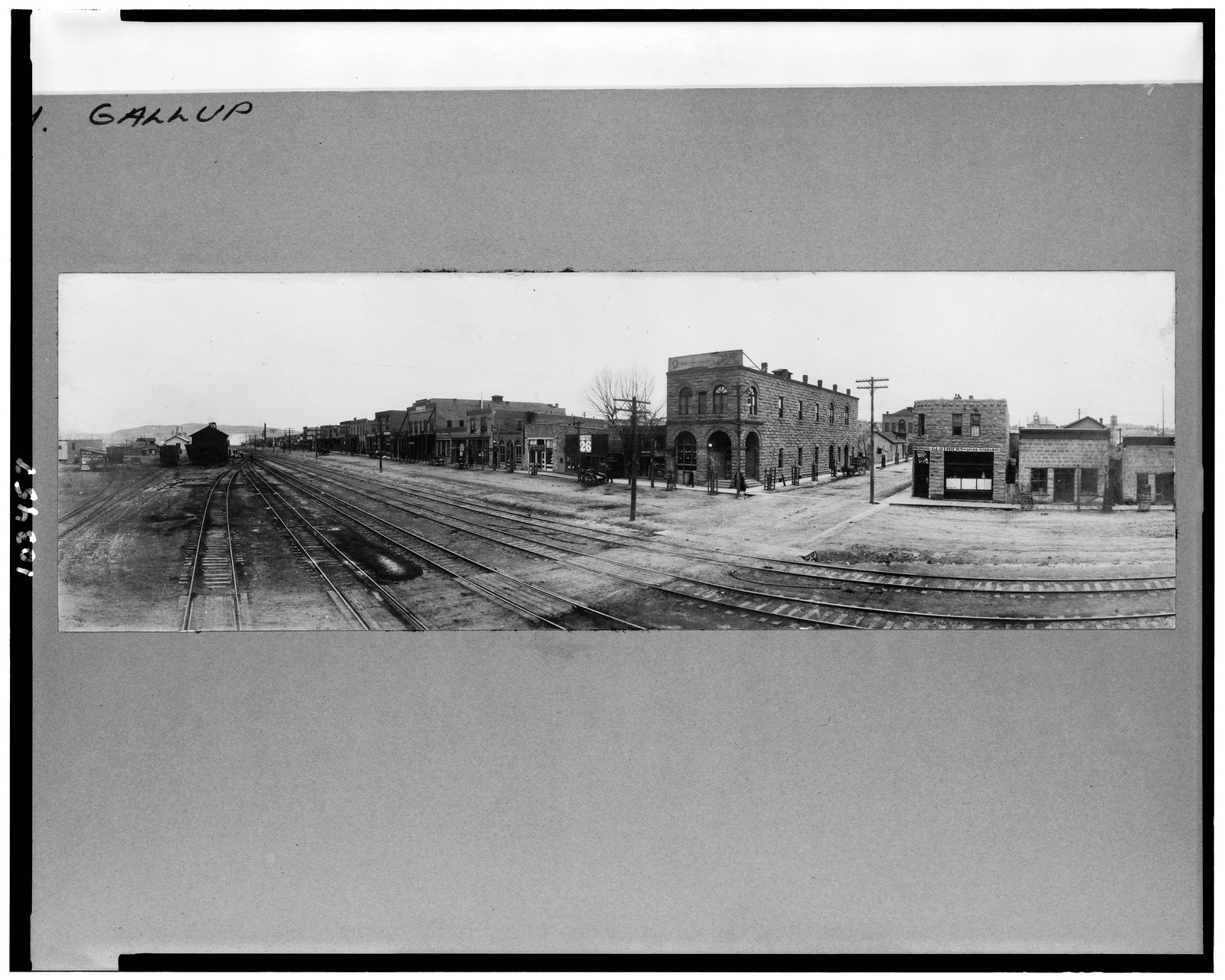 [View of railroad yard and city buildings, Gallup, New Mexico], c1908. — historic photograph