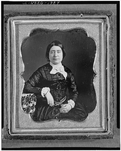 Unidentified woman thre