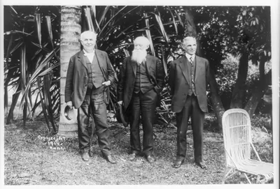 [Thomas Edison, John Burroughs, and Henry Ford posed standing, full-length, at Mr. Edison's home, Ft. Myers, Florida]