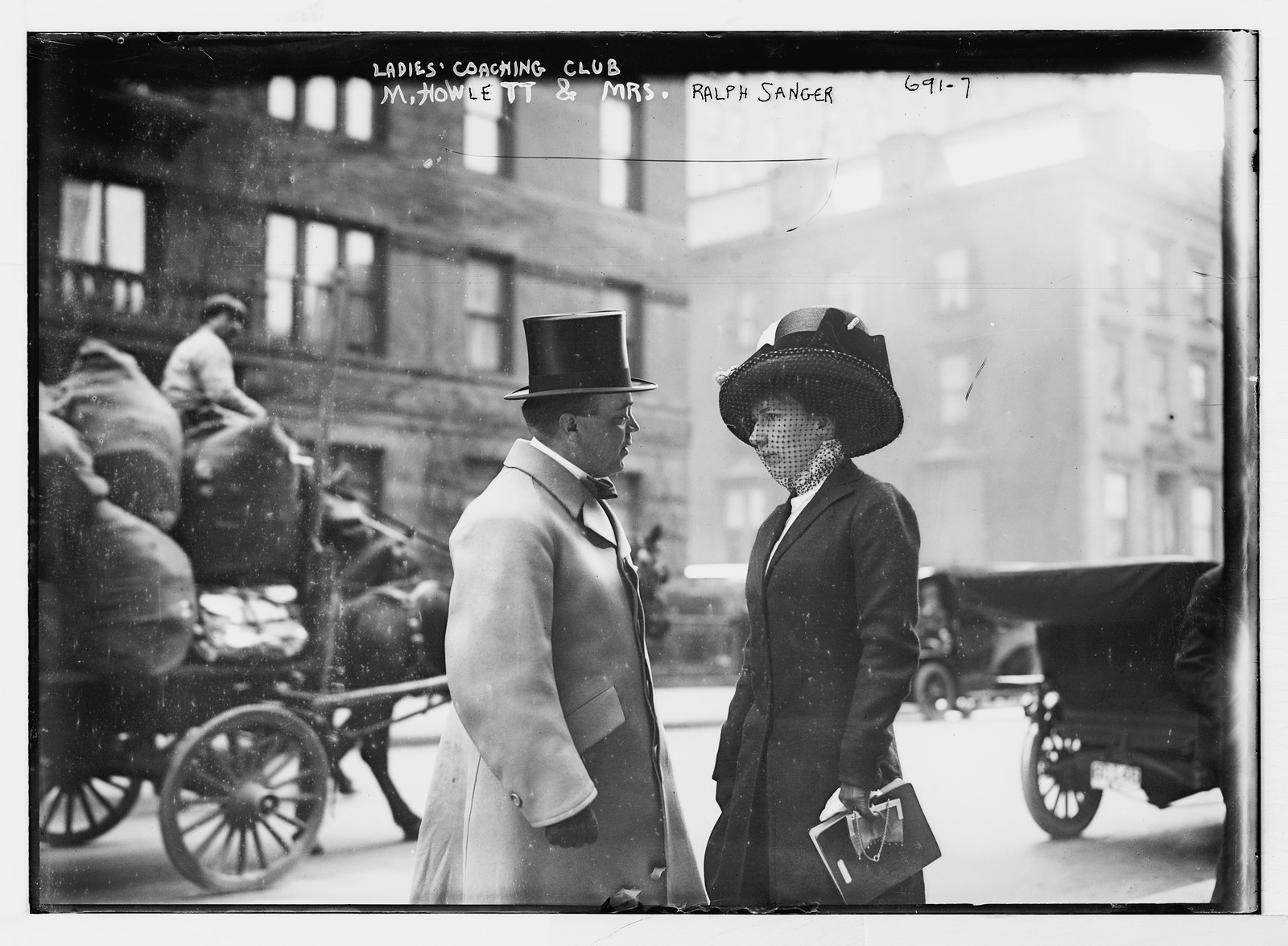 M. Howlett and Mrs. Ralph Sanger on street, New York, 4/09. — historic photograph