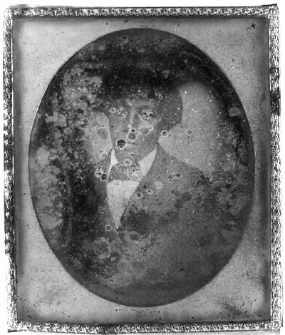 Daguerreotype portrait of a man in an oval vignette