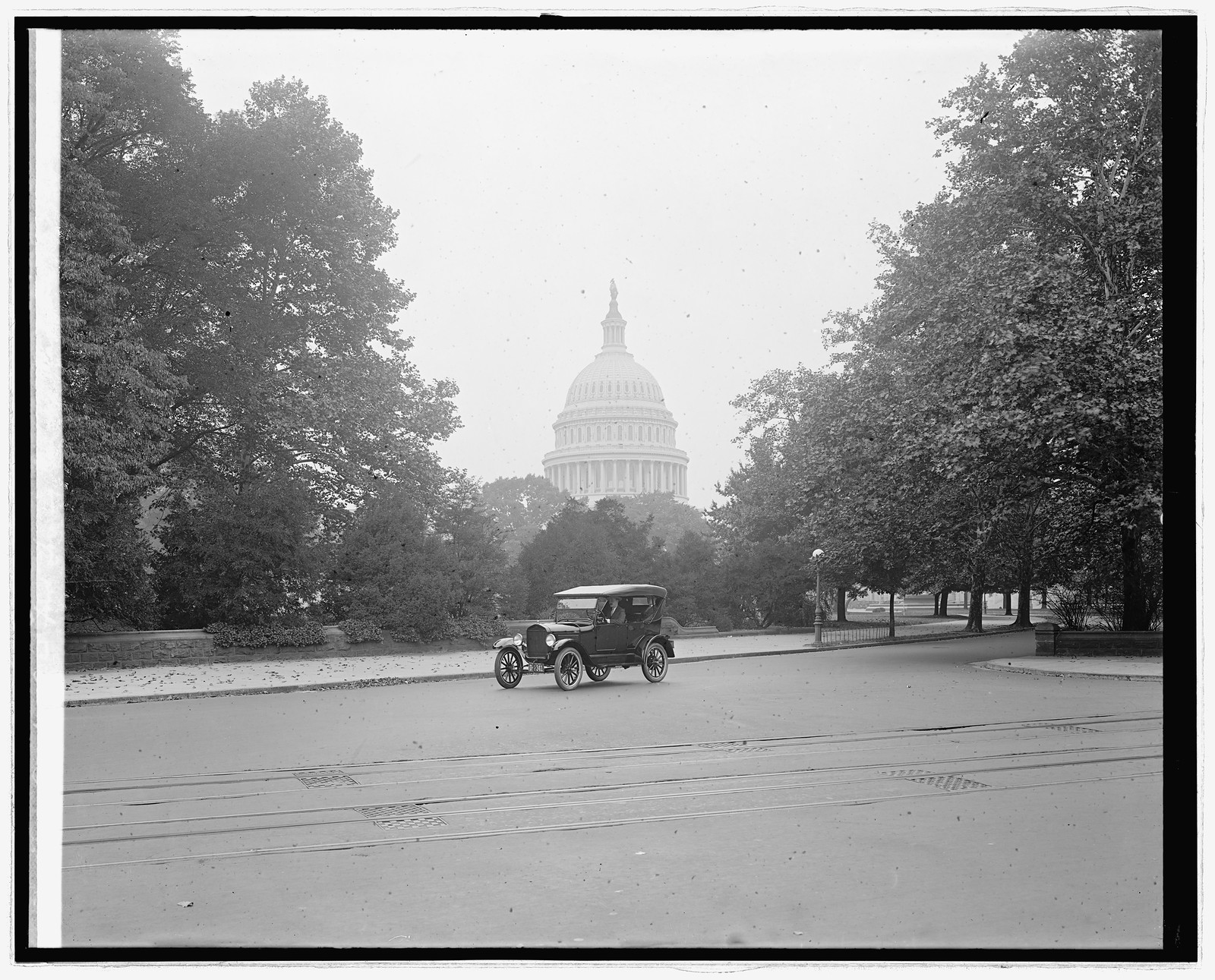 Ford Motor Co., Ford touring car at Capitol, [Washington, D.C.], [between 1910 and 1926] — historic photograph