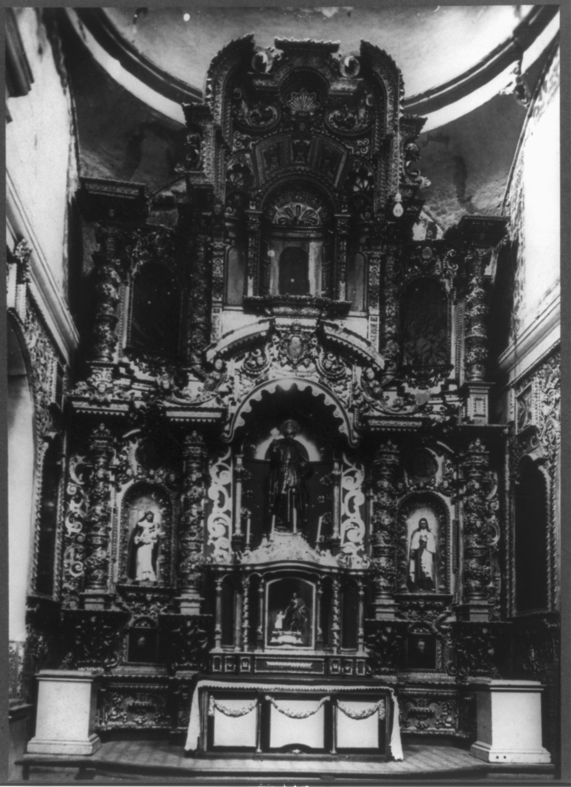 Altar of Iglesia de San Pedro [17th(?) century church], Lima, Peru, [no date recorded on caption card] — historic photograph