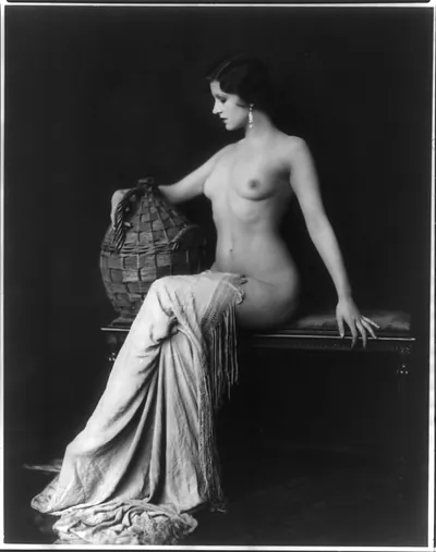[Dorothy Knapp, full-length portrait, seated, nude, left profile, with blanket draped over legs]