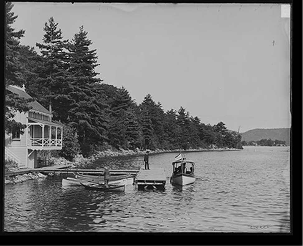 [Boat house at Rogers' Rock, Lake George, N.Y.], [between 1900 and 1910] — historic photograph
