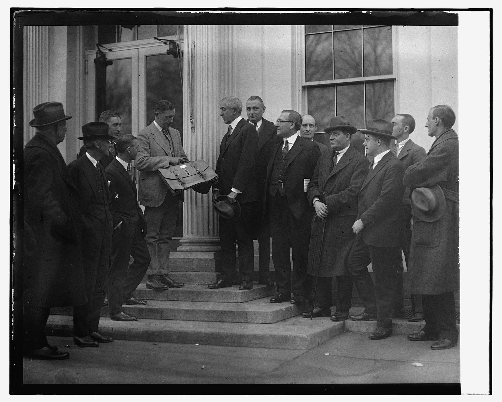 Slemp being presented with briefcase by correspondents, 1/24/25, [19]25 January 24. — historic photograph