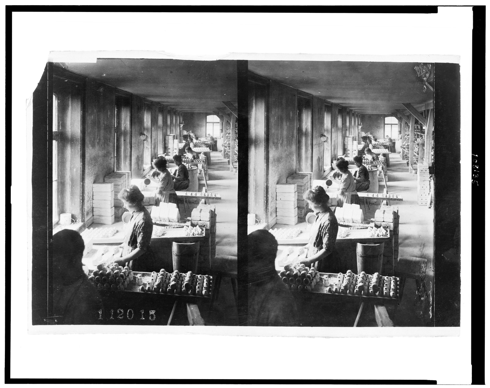 [Women molding doll heads], [1908] — historic photograph