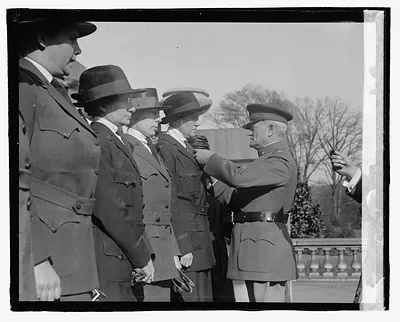 [Pershing and unidentified uniformed women on steps]